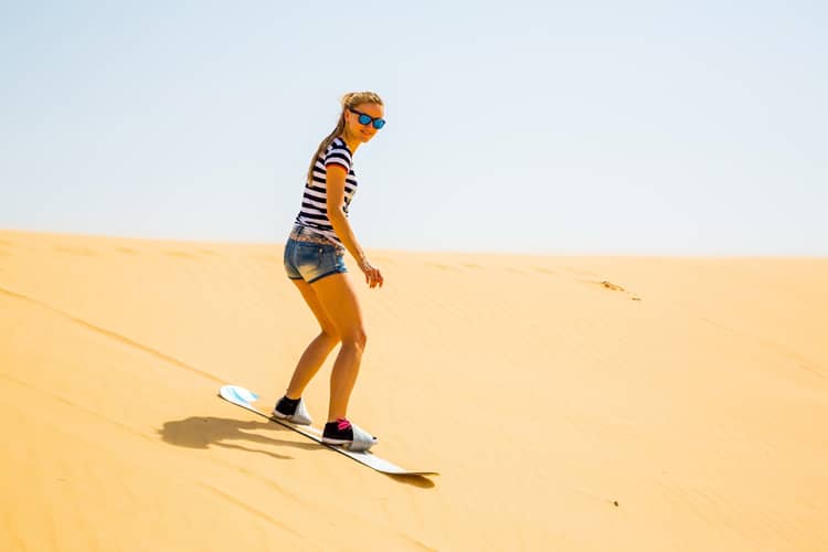 Sandboard in Merzouga Desert dunes